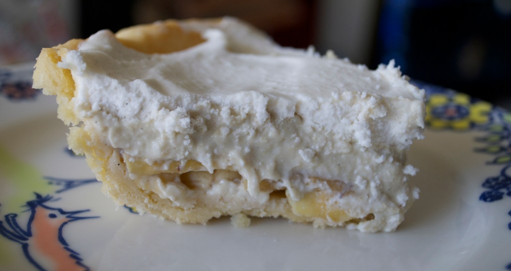 Homemade Short Crust--Layer of Apple Banana-Layer of Apple Banana Custard-Topped with Homemade Coconut Whipped Cream. 